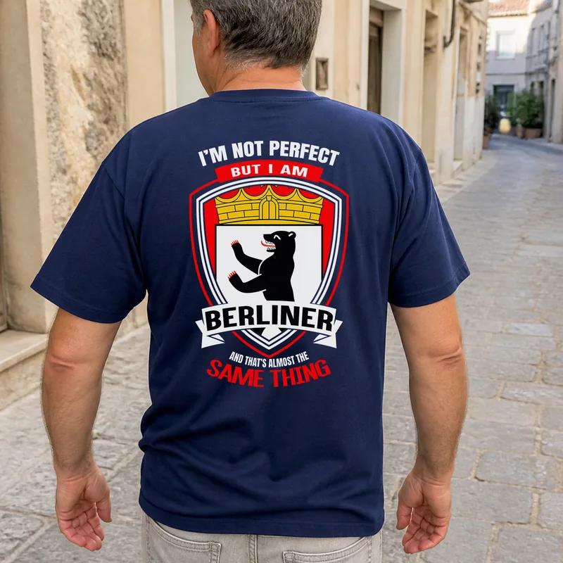 Navy tee, back print, on a European street